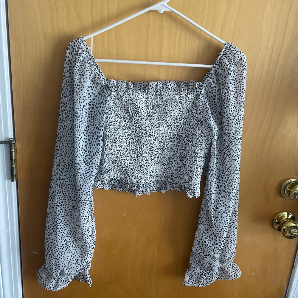 Black and white spotted blouse